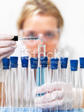 stock-photo-8776237-researcher-working-with-chemicals